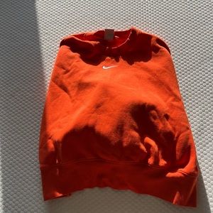 Orange Nike women’s cropped crewneck